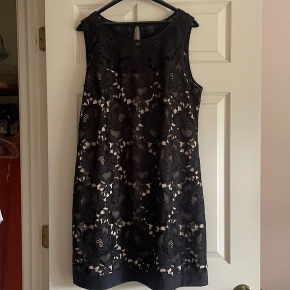 White House Black Market Dresses & Skirts - Beautiful black lace dress above the knee.